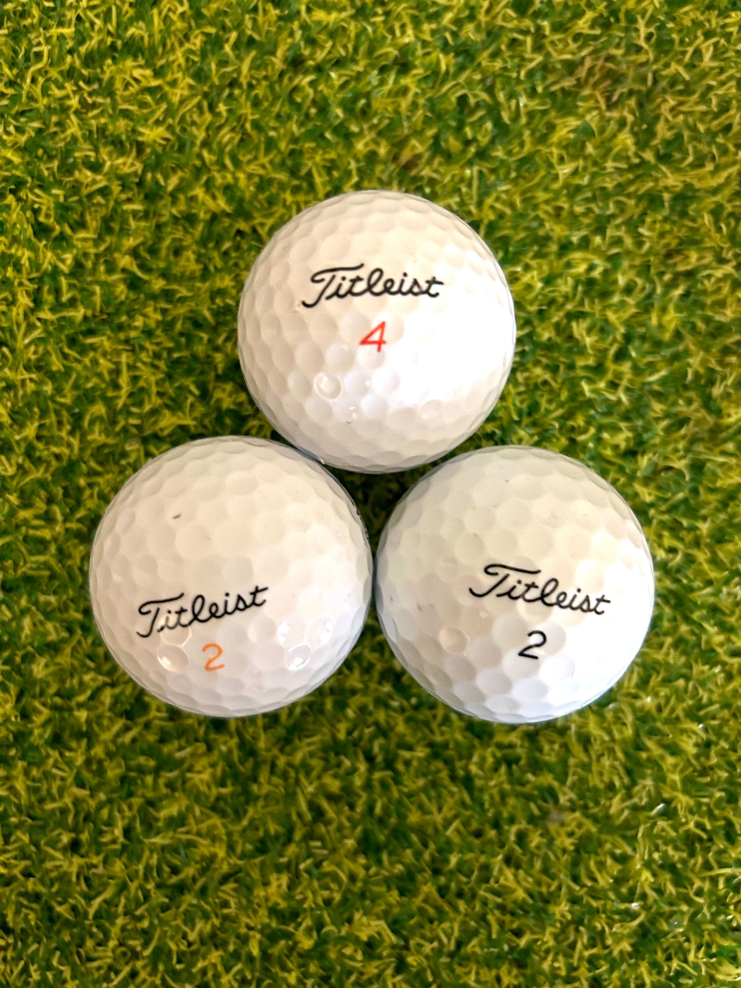 12 assorted Titleist golf balls