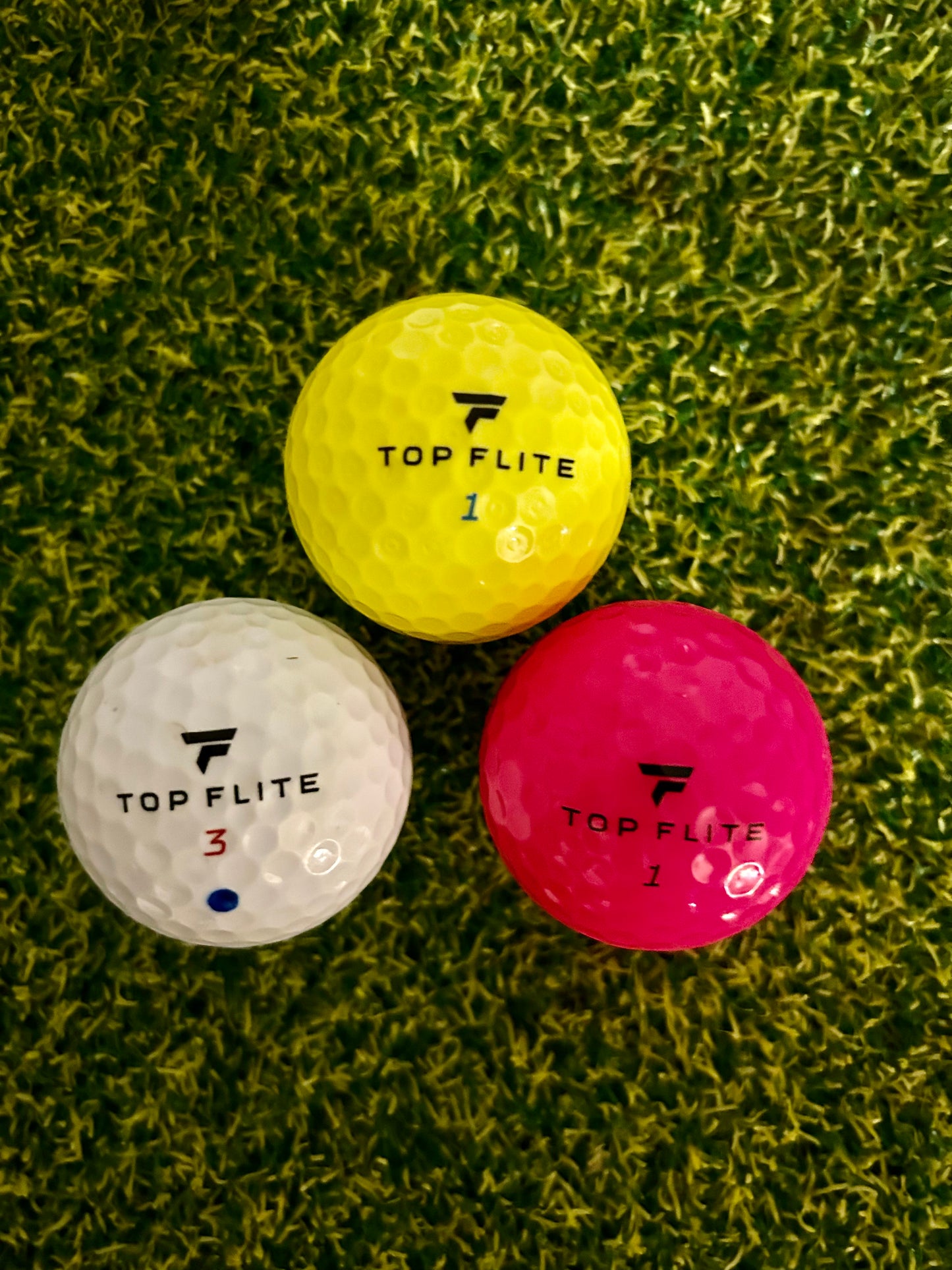 12 assorted Top Flight Golf Balls