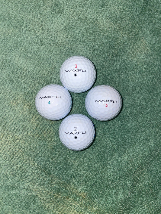 White Maxfli Golf balls